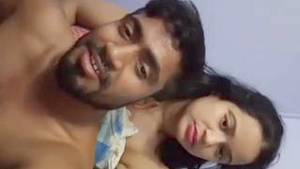 Indian woman squeezes her nipples in solo video