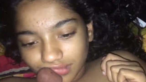 Pretty Indian girl gives a blowjob in a video