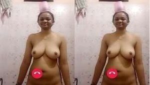 Shy Indian girl reveals her breasts to her partner in a video call