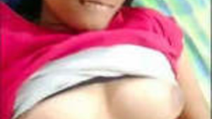 Horny girl pleasures herself in a hostel room