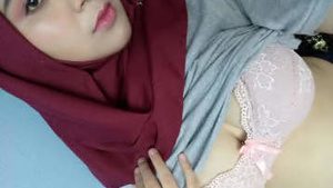 Muslim girl with hijab exposes her breasts and gets fucked