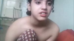 Cute Indian teen babe shows off her innocent side in a solo video