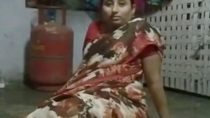 Indian aunty Sailaja shows off her curves in a steamy video