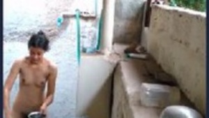 Hidden camera captures a cute Latina teen girl taking a bath