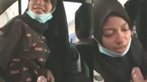 Hijabi teen gives a blowjob and gets fucked in the backseat of a car