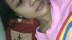 Cute Sri Lankan girl flaunts her large breasts in solo video