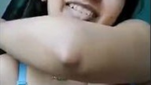 Cute teen with her lover in steamy video