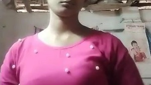 Indian housewife flaunts her breasts in a steamy video