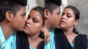 Two Indian lovers share a passionate kiss in a steamy video