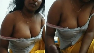 Tamil girl gives a sensual handjob in a steamy video