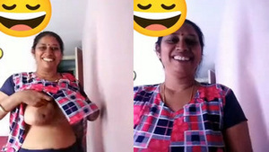 Desi bhabhi flaunts her big tits and shaved pussy