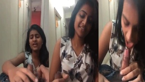 A young woman in college performs oral sex on her partner in a video