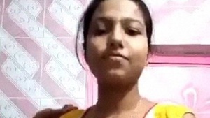 Bangladeshi girl's nude striptease and fingering in solo video