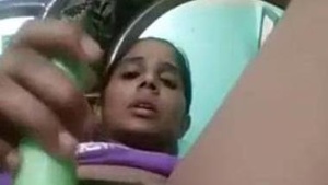 Watch a woman from India pleasure herself with a vegetable