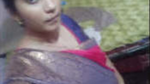 Indian girl flaunts her large breasts