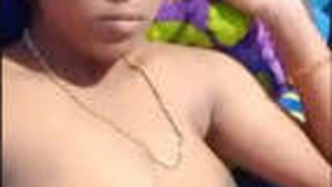 Tamil bhabhi flaunts her breasts and vagina in a steamy video