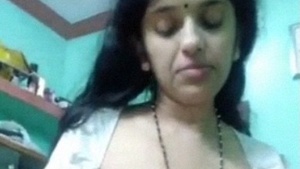 Mature Indian wife's big tits and curvy body revealed in cheating sex video