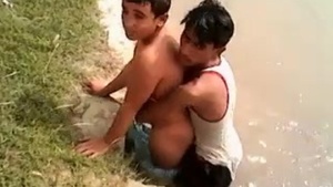 Watch two Indian men have sex on a riverside in this explicit video