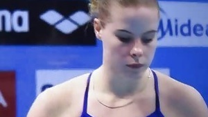 Watch this sporty girl swim in a videotaped pool