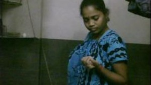 Mallu bhabhi strips and shows off her big tits in the bathroom