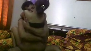 Young couple enjoys hardcore sex in home video