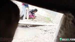 Desi girl in a sari enjoys peeing in a MMS video