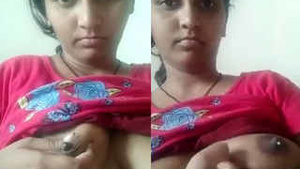 Desi girl presses her nipples together in solo video