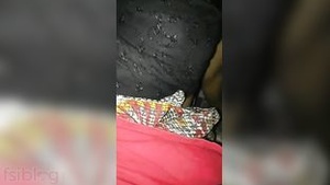 A timid Indian bhabhi bares her unshaven pussy in a video