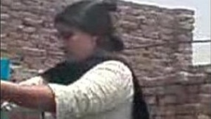 Desi aunty and friend indulge in outdoor sex in terrace