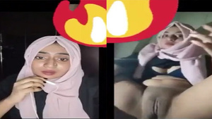 Desi village girl shows off her sexy boobs and fingering pussy in hijab