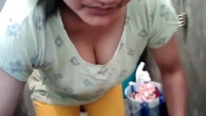 Horny aunty washing clothes, exposing her big boobs
