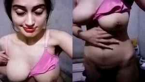 Pakistani babe shows off her big boobs and masturbates in the bathroom