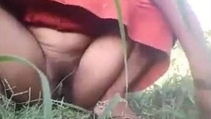 Indian wife pees in the field