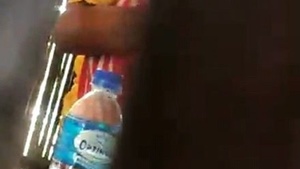 A couple enjoys a standing fuck in a public restaurant, with the act captured covertly