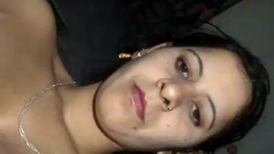 Desi aunty masturbates and licks her pussy in a selfie video