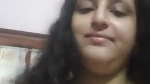 Busty Indian Bhabhi flaunts her assets on camera