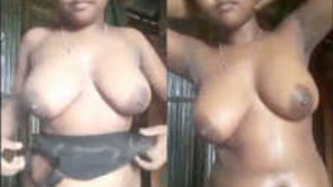 Indian girl reveals her breasts and pleasures herself with her hands