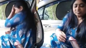 Busty mallu gives a blowjob to her lover in a car