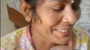 Indian middle-aged wife gives a blowjob